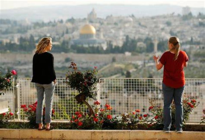 Cassidy Heaton and Chelsea Neubert, students at the BYU Jerusalem Center, look over the view of the Old City in Jerusalem on Friday, April 13, 2018.