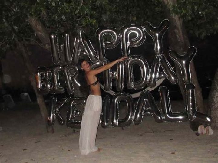 Kendall Jenner Sunbathing Satin Trousers