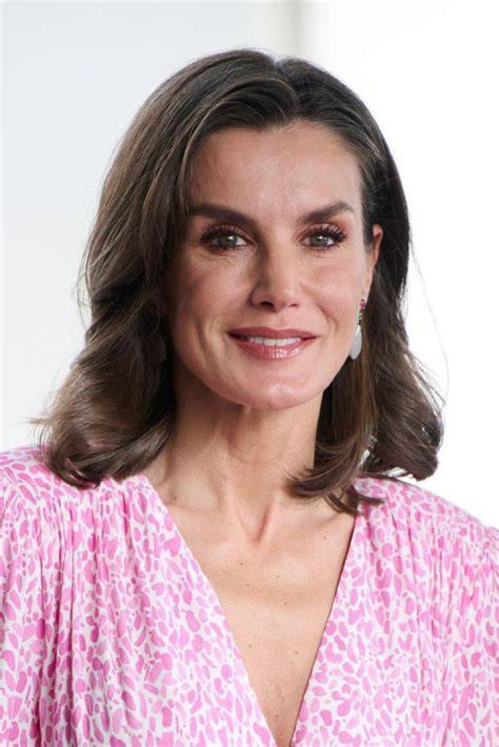 Queen Letizia epitomises class in designer look on sombre occasion